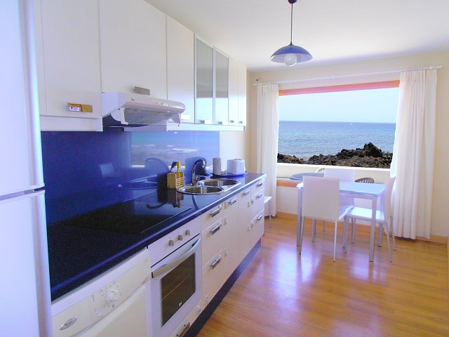 Kitchen with sea views